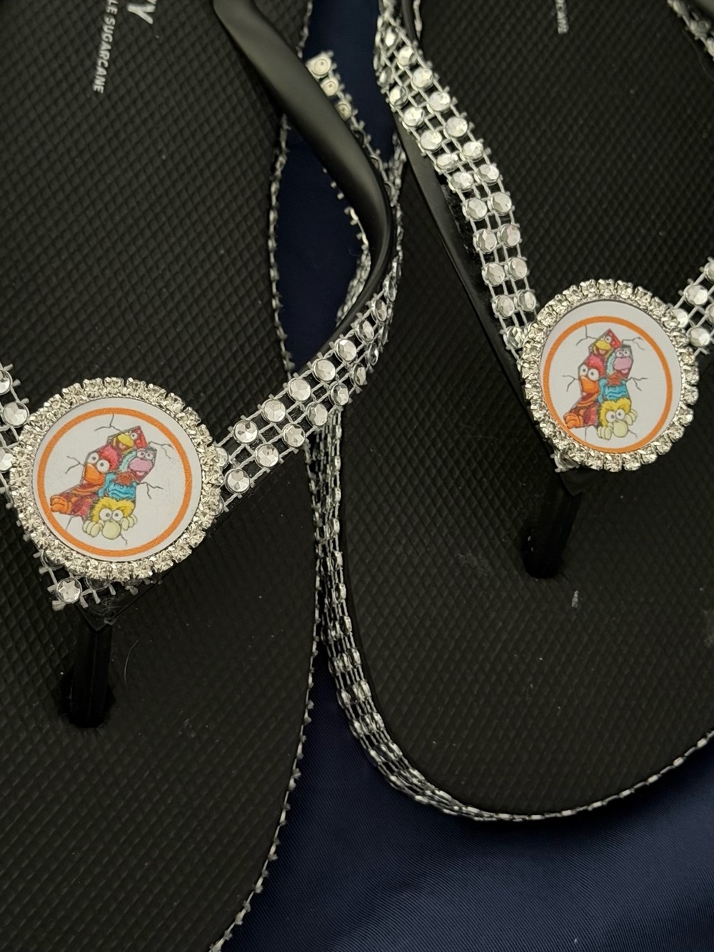 Rhinestone Flip Flops with Cartoon Medallion